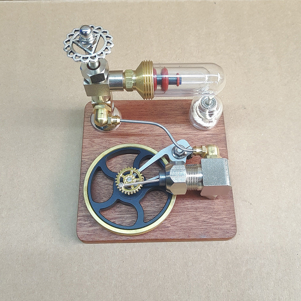 Stirling engine model on a square wooden base, top-front view
