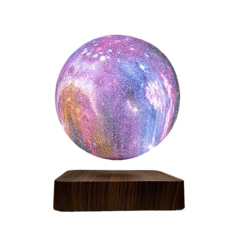 Galaxy globe floating above a deep wood-grain base on a white background