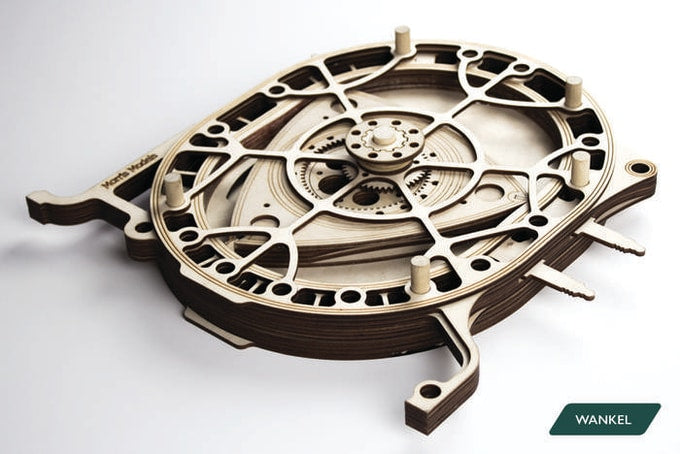 Wankel-style rotary engine kit in laser-cut plywood, labelled Wankel