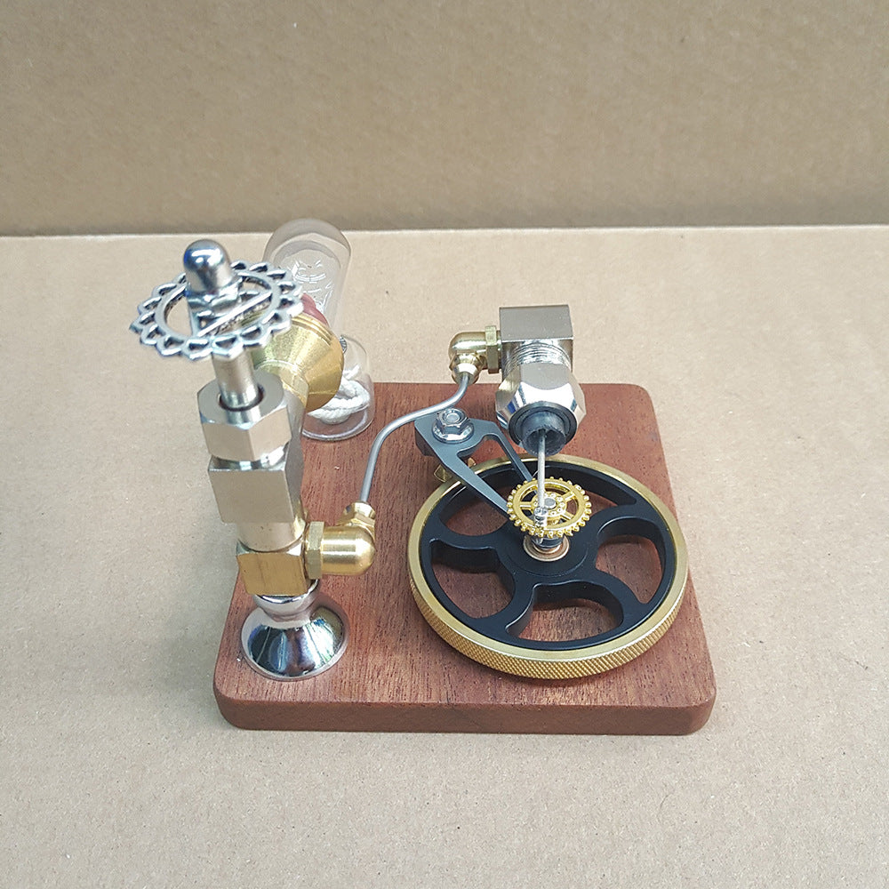 Stirling engine model seen from the side, with a decorative gear handwheel on the adjusting valve