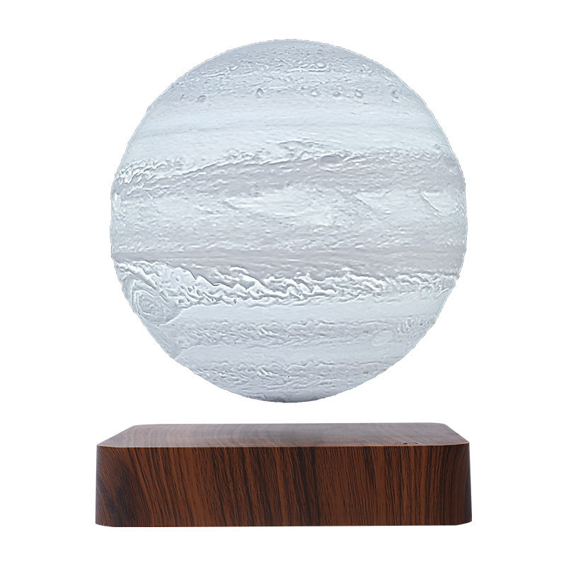 Jupiter globe in cool white light floating above a deep wood-grain base