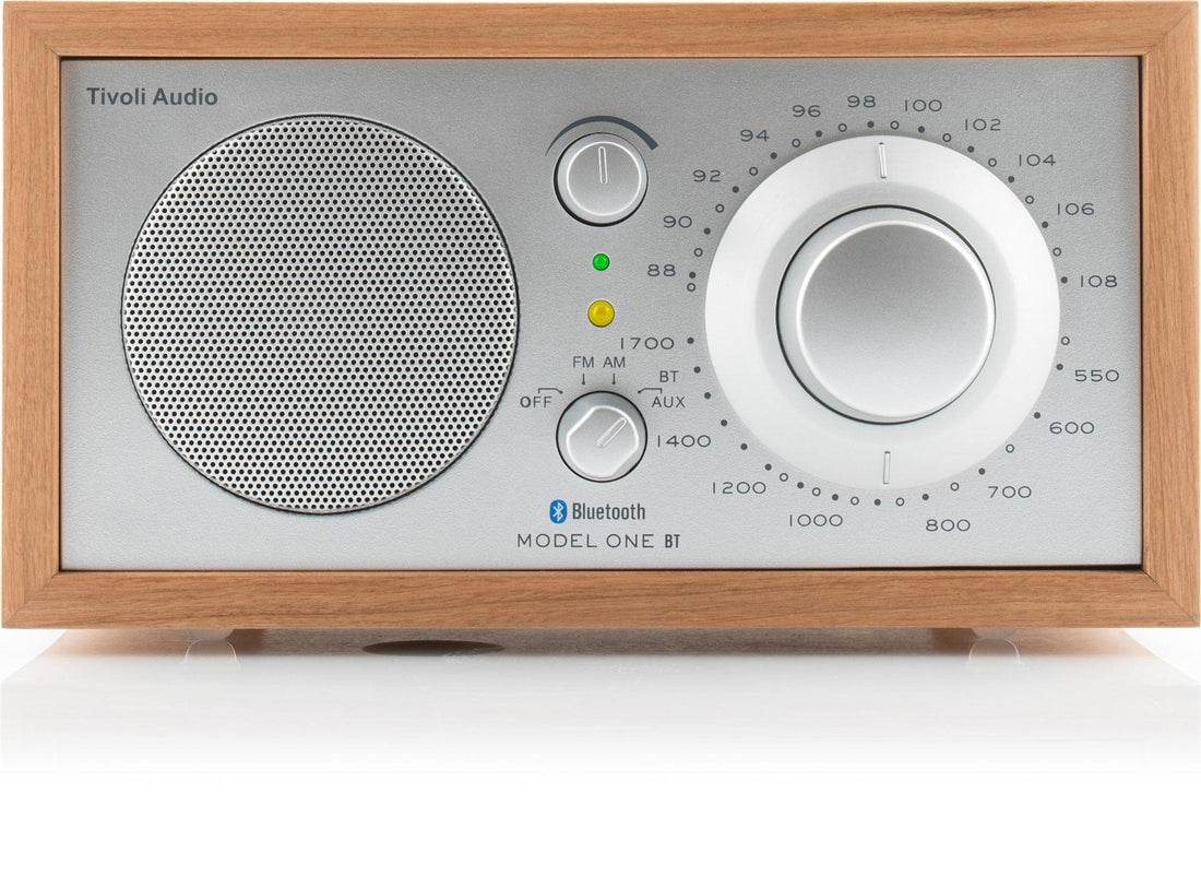 Cherry cabinet radio with a silver face, front view
