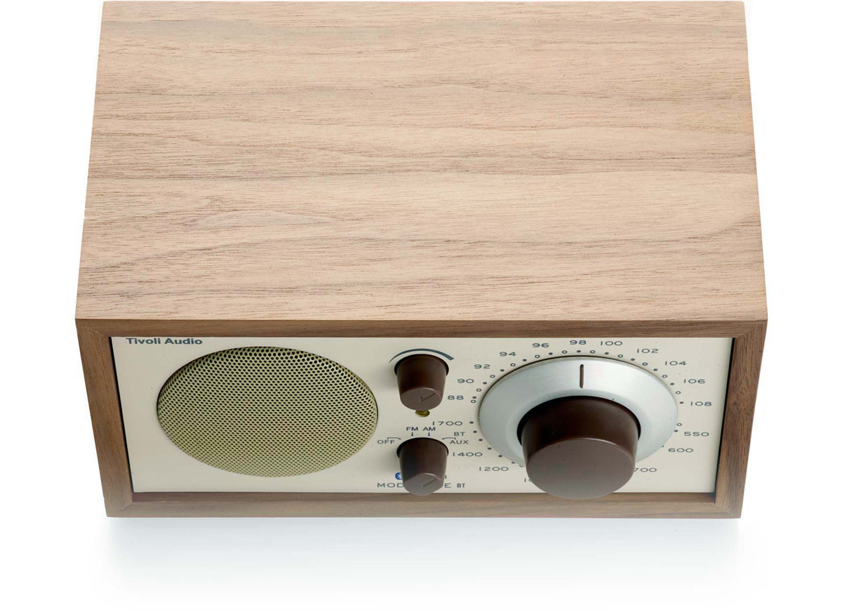 Top and front of the walnut radio showing the wood grain on the lid